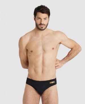 Arena Team Solid Brief Black / Gold | 83765-RUFQ